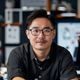麻豆涩漫内容运营总监王浩宇头像，年轻男性，创意工作者形象，背景为内容编辑工作台